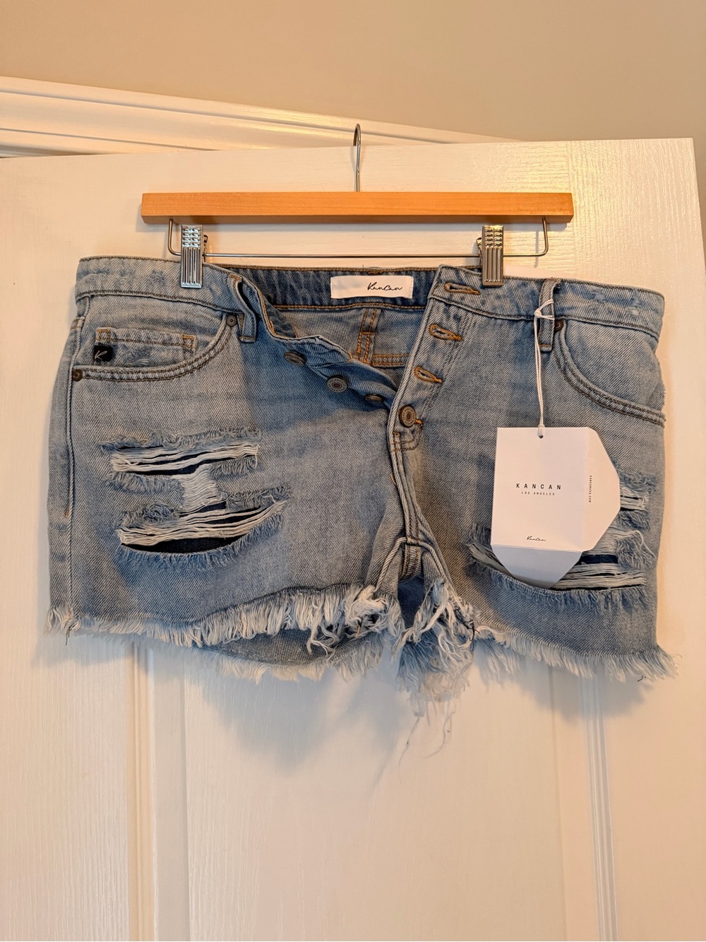KanCan Light Blue Distressed Denim Shorts with Frayed Hem